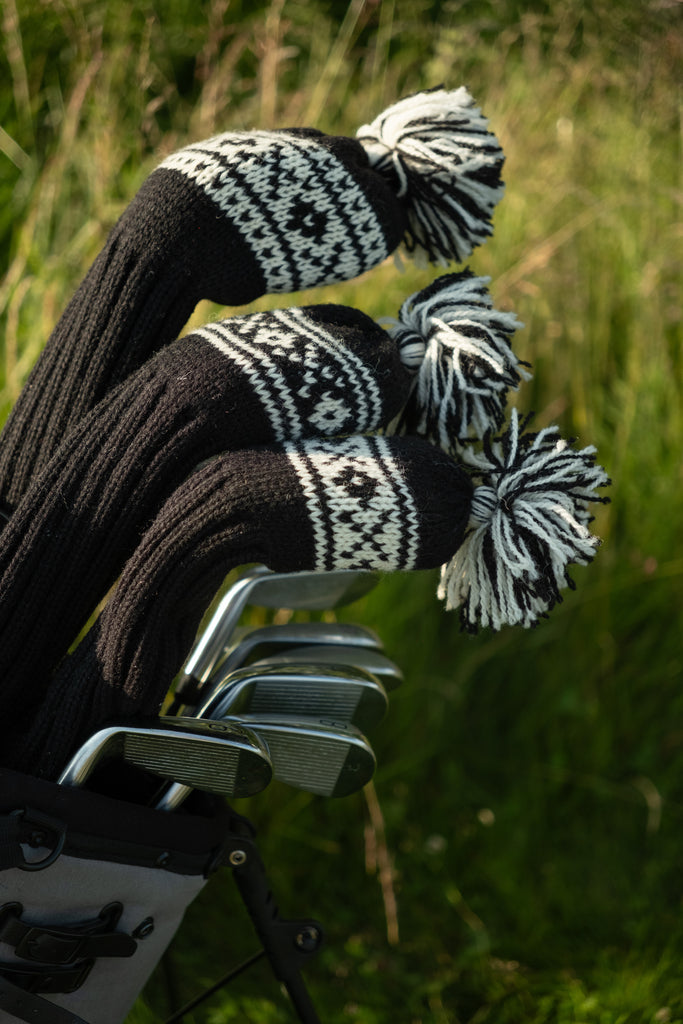 Black wool knit golf headcovers with Scandinavian design – timeless accessories for players who value refined style