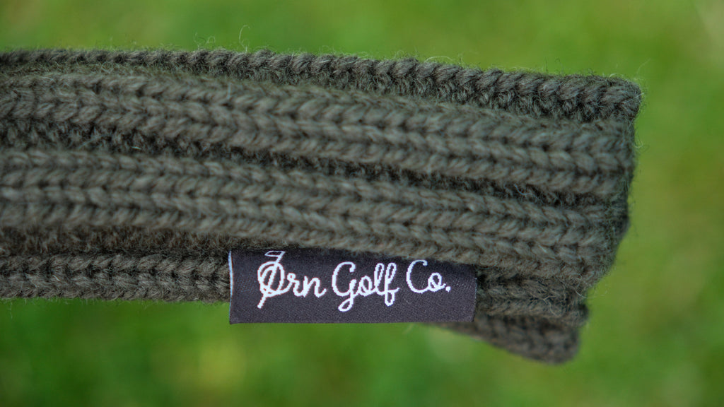 Ørn Golf Co. logo. Embroided details of premium wool knit headcovers form Orn Golf Co.